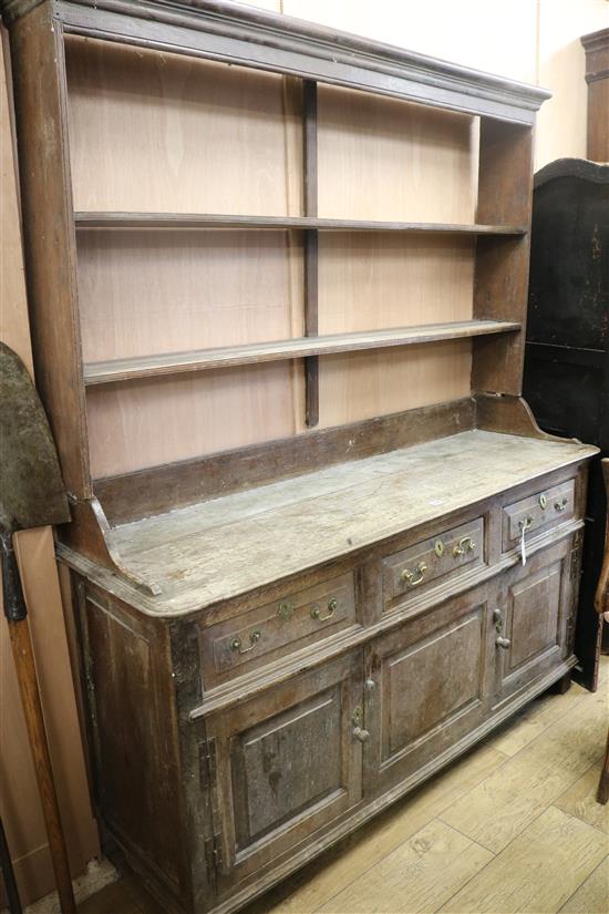 A mid 18th century oak dresser, W.165cm